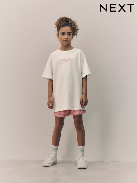 أبيض/وردي زهور - Oversized Graphic Print T-Shirt (3-16yrs) (E45296) | ‏46 د.إ.‏ - ‏ 71‏ د.إ.