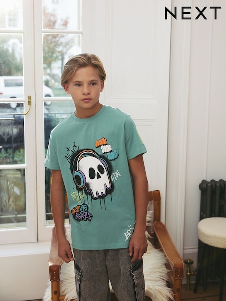 جمجمة غرافيتي خضراء - Regular Fit Short Sleeve Graphic 100% Cotton T-Shirt (3-16yrs) (E45691) | ‏35 ر.ق. - ‏49 ر.ق.