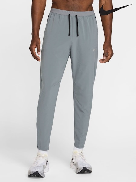 Nike Smoke Grey Dri-FIT Stride Woven Running Joggers (E46287) | €113