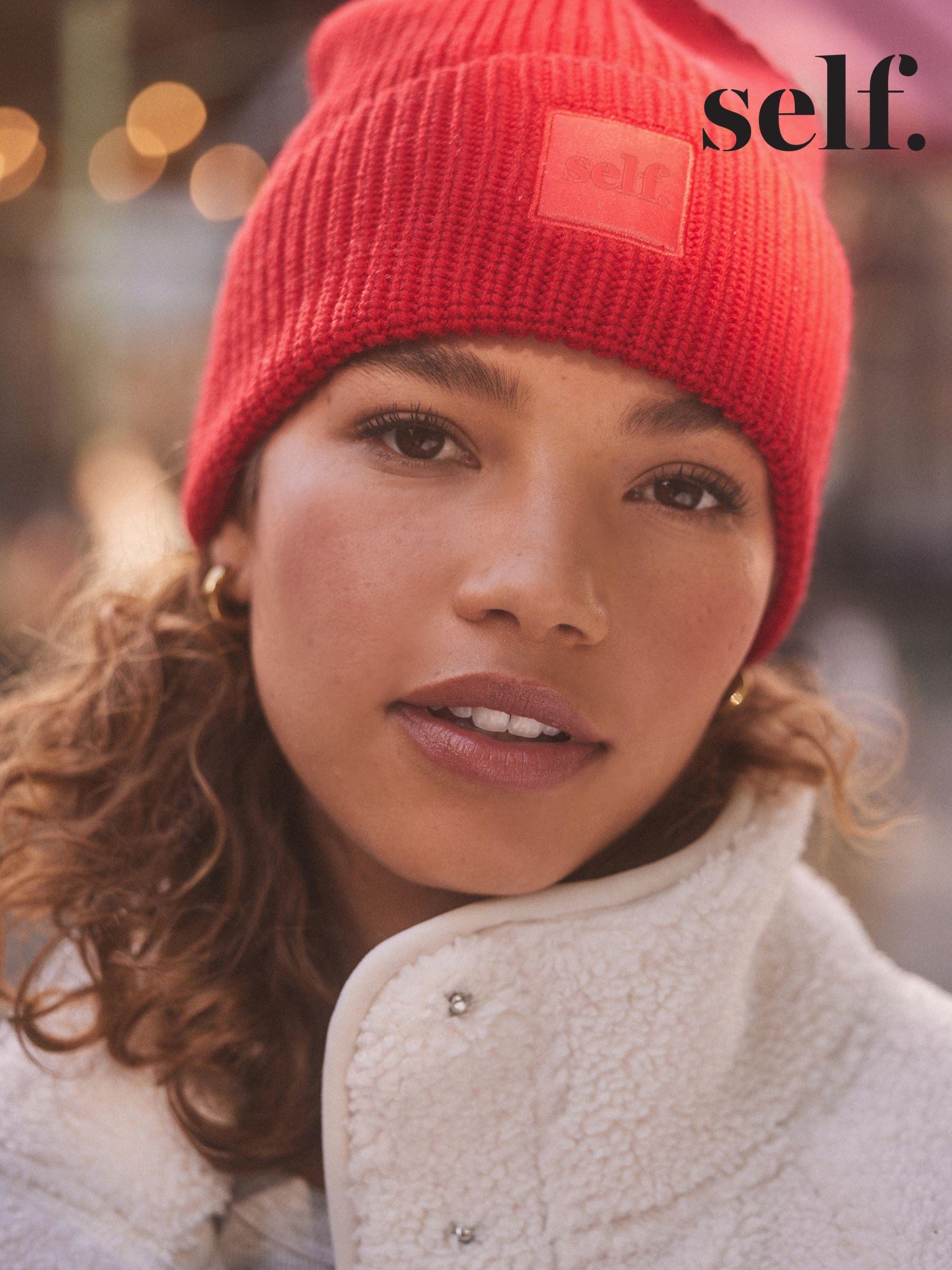 Women's red beanie hat top