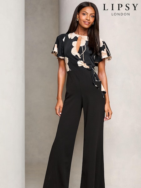 Negro floral - Lipsy Flutter Sleeve Tie Side Wide Leg Jumpsuit (E88039) | 82 €