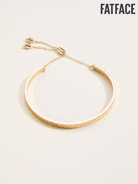 FatFace Gold Tone Hammered Bangle (F21620) | AED84