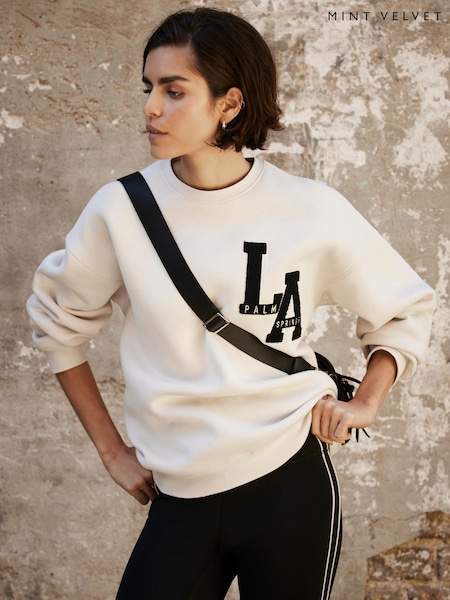 Mint Velvet Cream Cotton Blend Relaxed Glamour Logo Sweatshirt (F23546) | €66