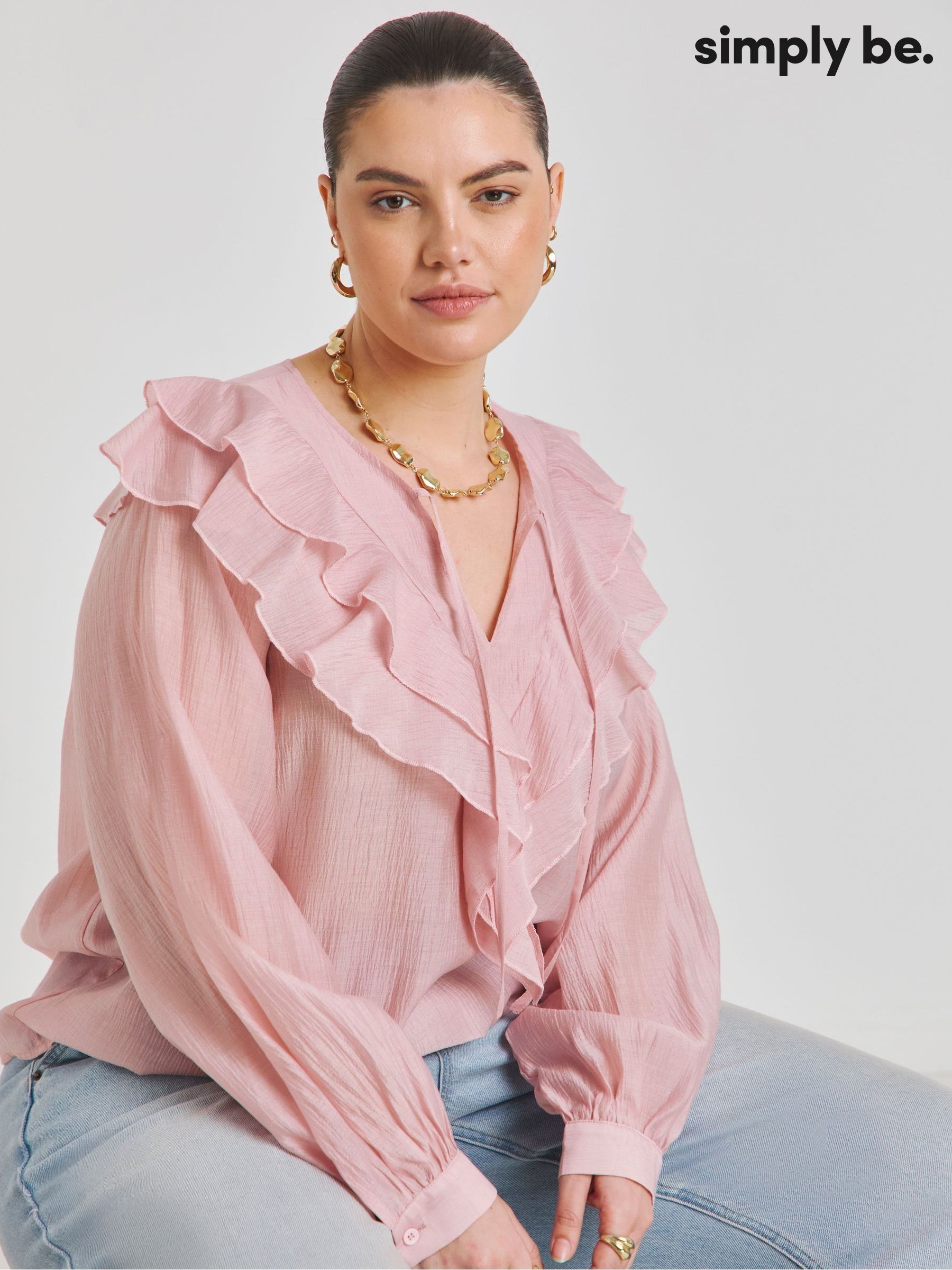 pink ruffle neck blouse