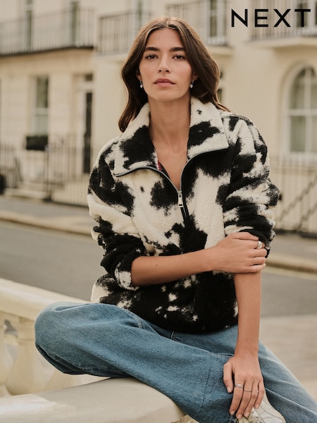 Black/Ecru Cow Print Soft Touch Cosy Teddy Borg Quarter Zip Fleece (F64991) | € 47
