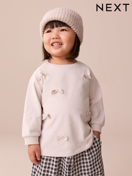 Cream Bow Applique Long Sleeve Bow Appliqué Top (3mths-7yrs) (F79828) | €8 - €11