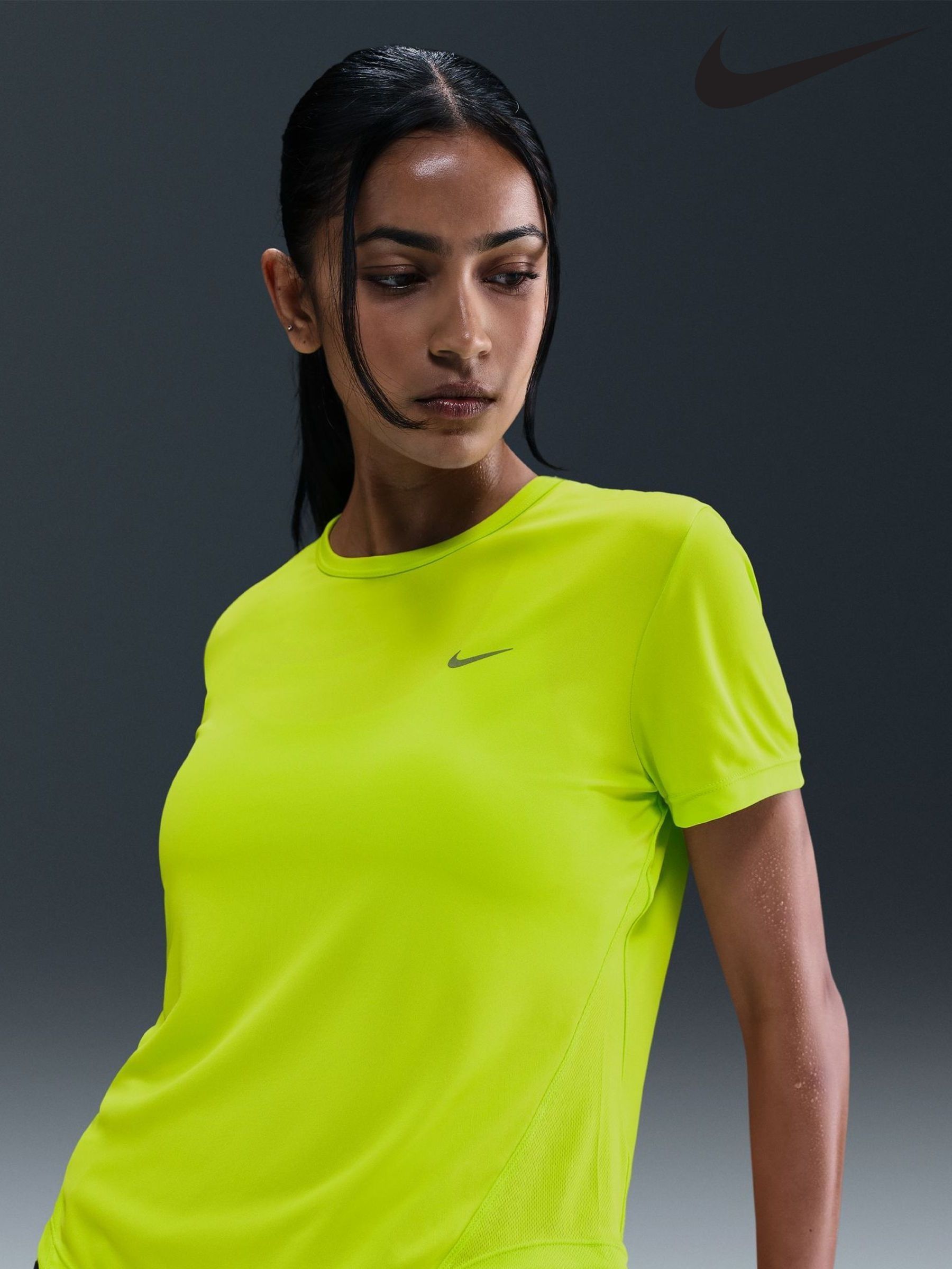 yellow and green nike shirt