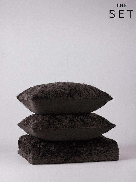 The Set 3 Piece Textured Faux Fur Throw And Cushion Covers