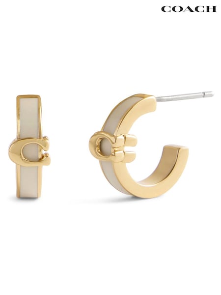 COACH Cream Signature C Enamel Huggie Earrings (G59113) | $187