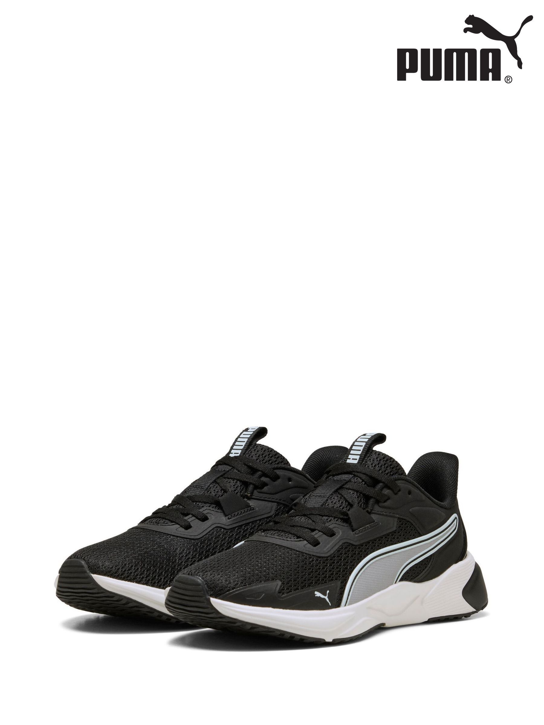white puma shoes with black stripe