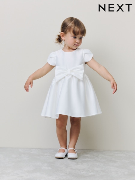 Ivory Girls Flower Bow Front Dress (3mths-10yrs) (H44146) | €55 - €64