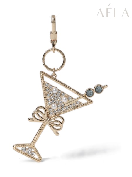 Aela Gold Tone Christmas Champagne Bag Charm (H49159) | €14