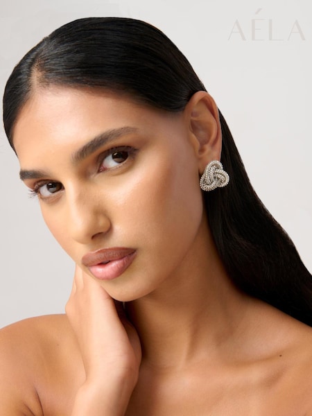 Aela Silver Tone Sparkle Knot Stud Earrings (H77913) | ‏65 ر.ق.