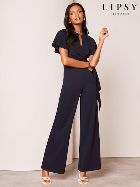 Lipsy Navy Petite Flutter Sleeve Tie Side Wide Leg Jumpsuit (K84054) | €24