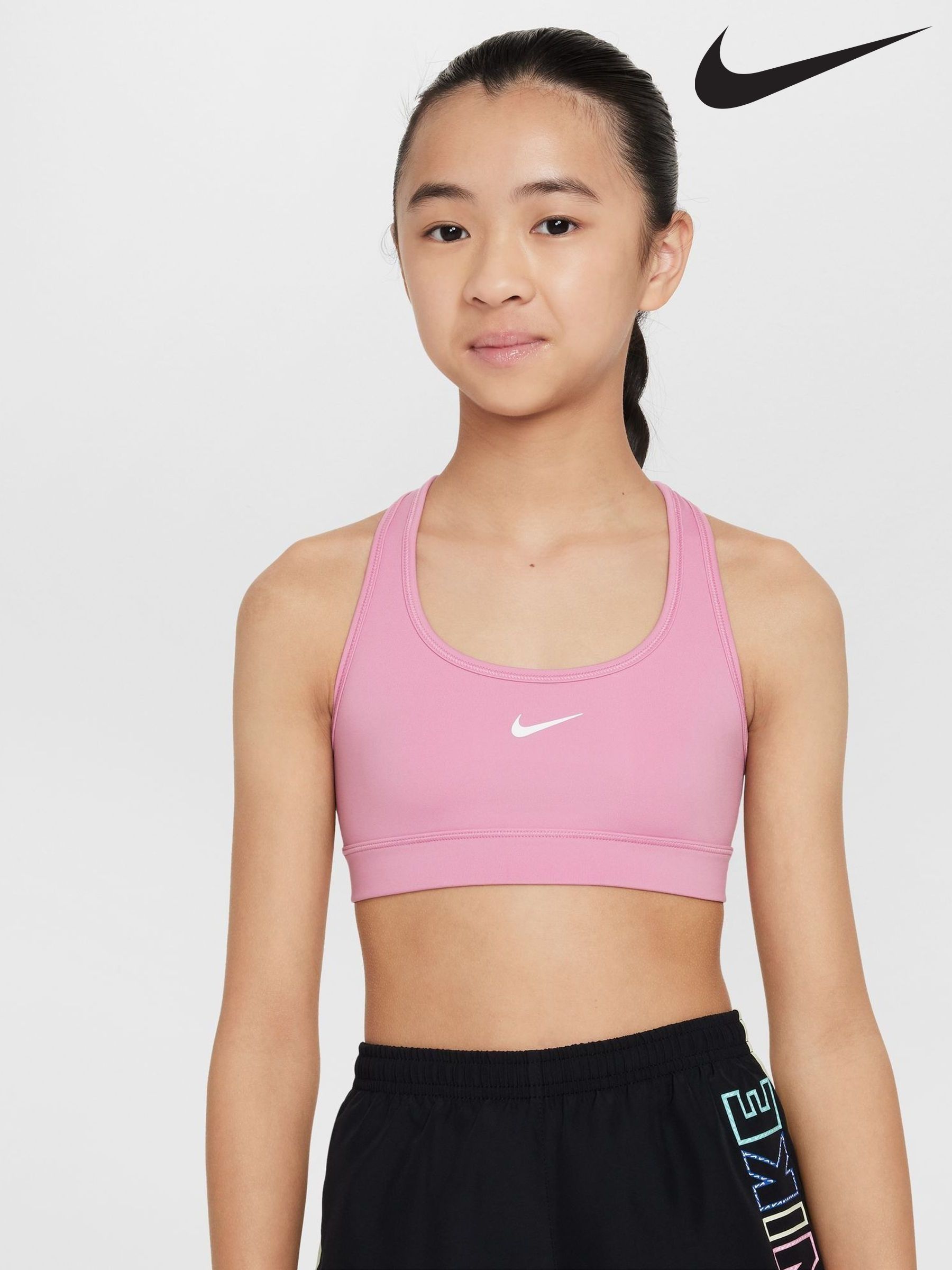 Girl in sports bra and underwear shop