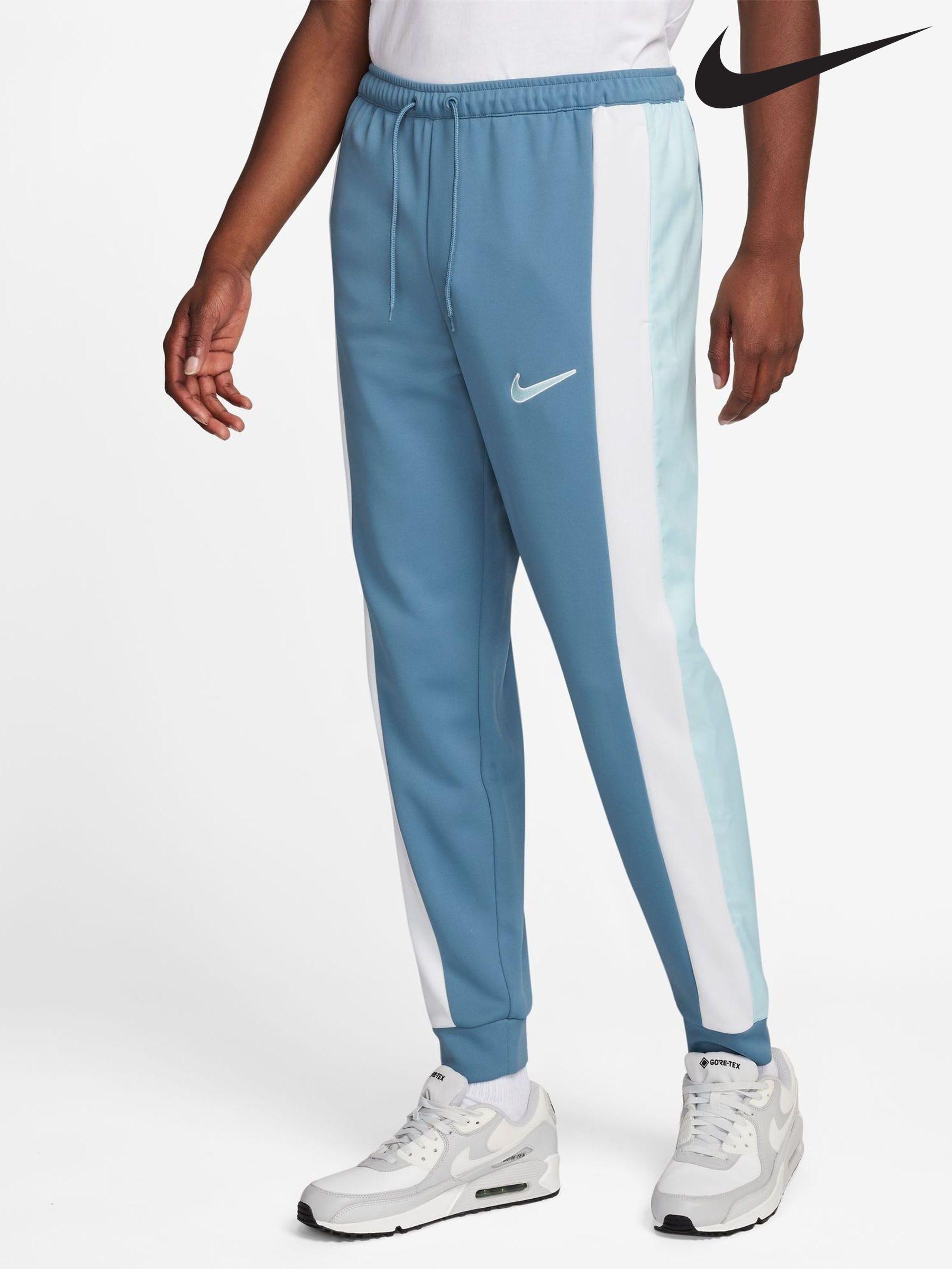 Nike striped joggers deals