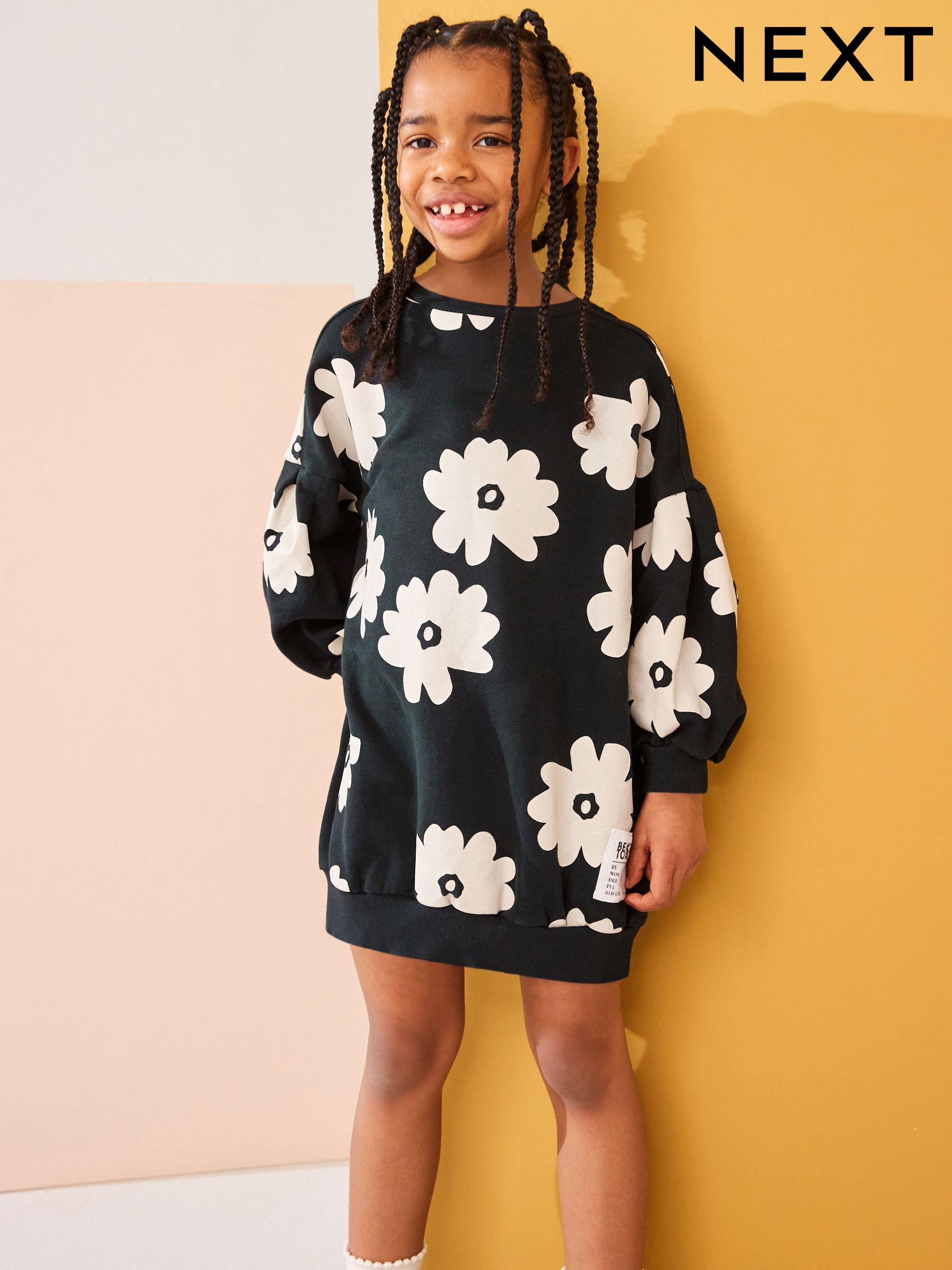 Girls black jumper dress discount