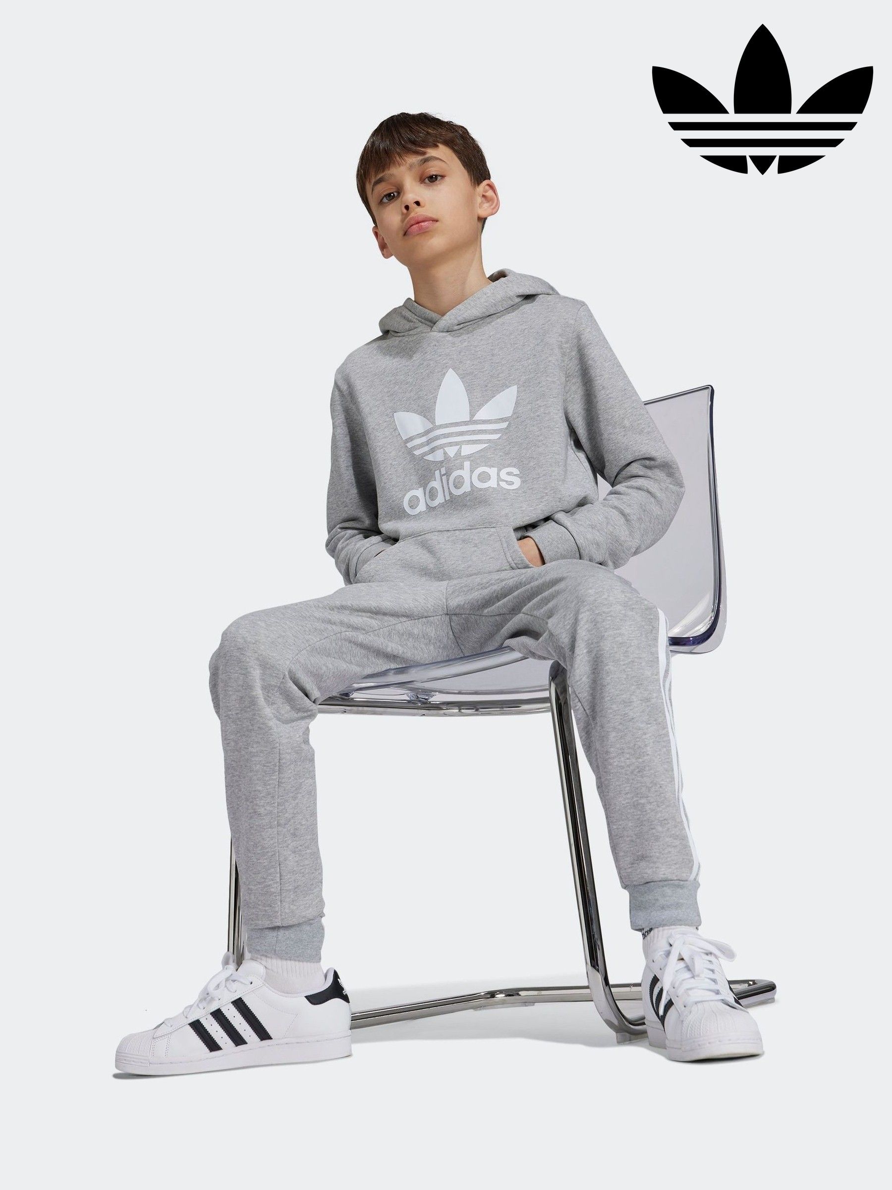 Adidas originals joggers with trefoil print in grey shop