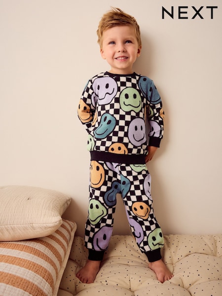 Neutral/Black Checkerboard Smile Face - Zachte pyjama van fleece met elastaan (9mnd -12jr) (N27776) | € 15 - € 20