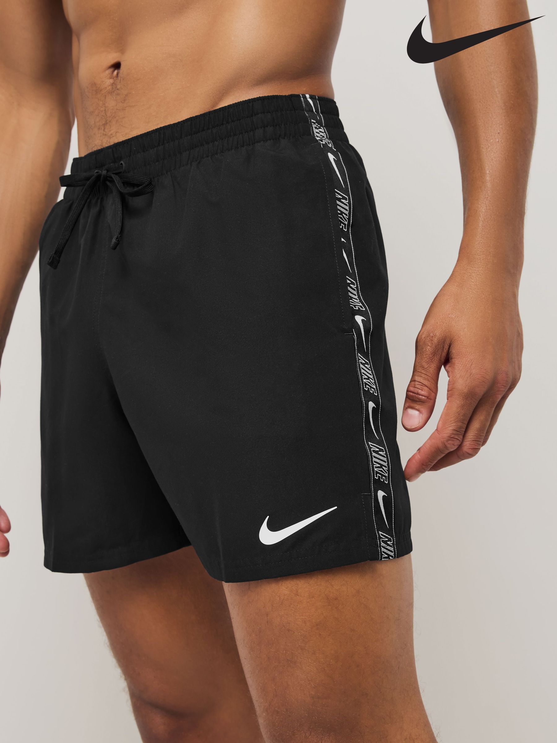 white swim trunks nike
