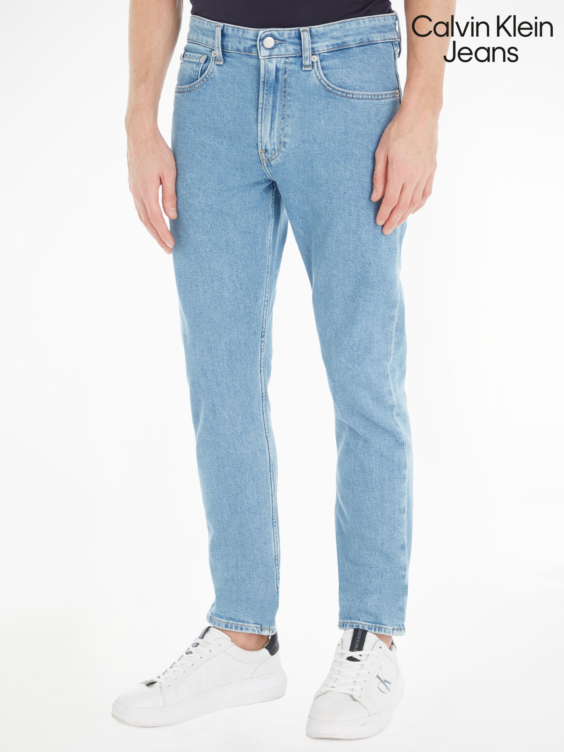 Slim tapered fit jeans mens store