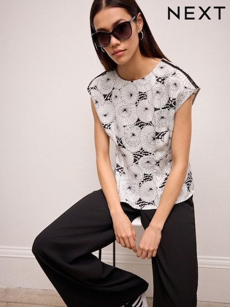 Črno-bela majica s potiskom - Short Sleeve Woven Mix T-Shirt (N57465) | € 15