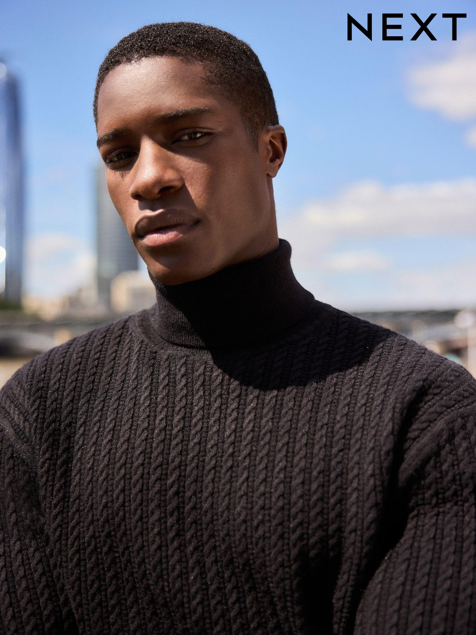 Black roll neck chunky jumper hotsell