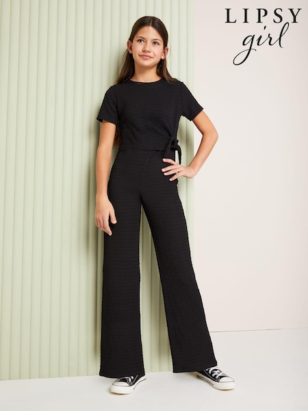 Lipsy Black Tie Side Crinkle Texture Jersey Jumpsuit (5-16yrs) (Q60470) | €8 - €10