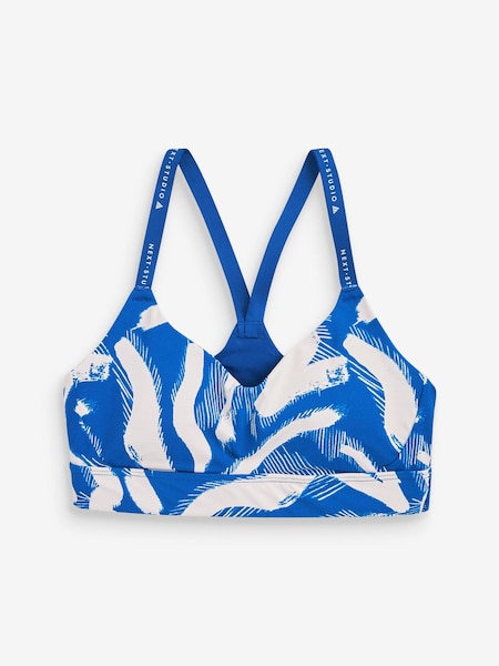 Impression bleue - Soutien-gorge de sport court Tech Run à impact moyen (U89159) | € 10