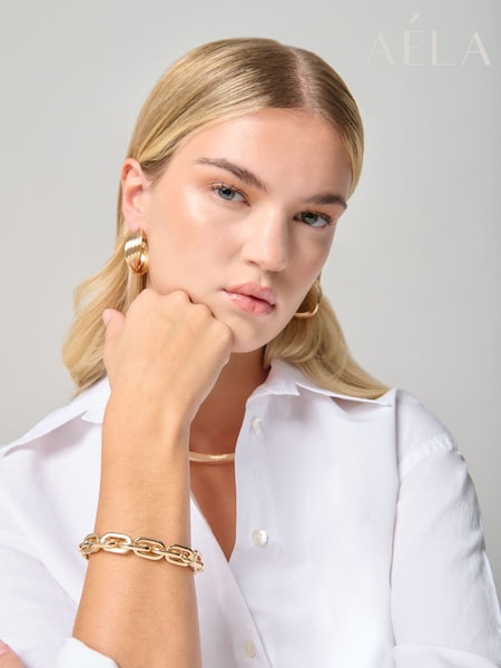 Aela Gold Tone Chain Wristwear Bracelet (V01499) | AED84