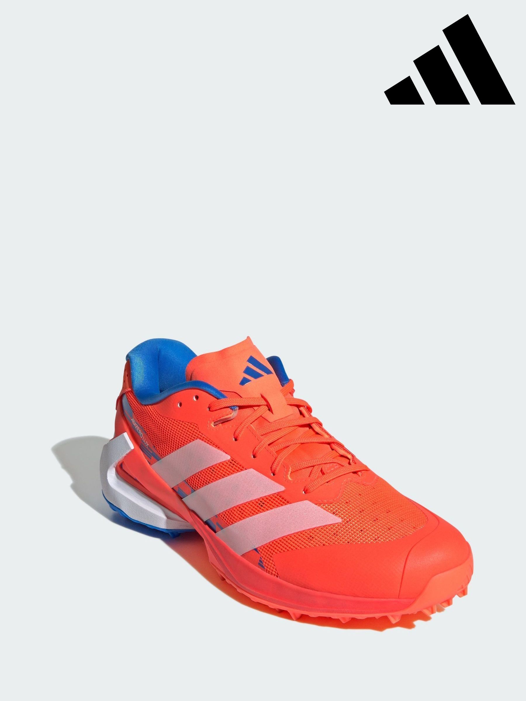 adidas shoes with orange stripes