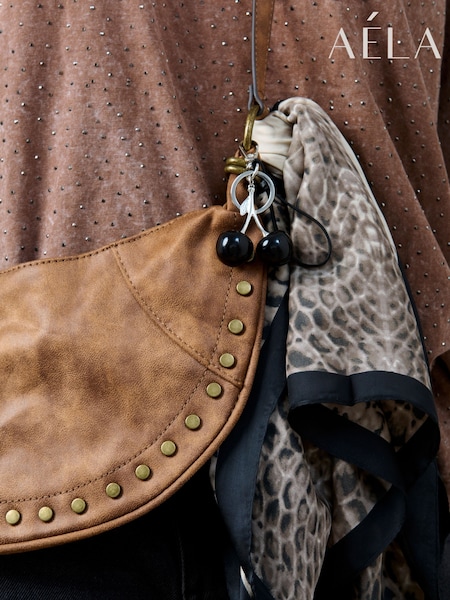 Aela Cherry Black Bag Charm (W24826) | €20