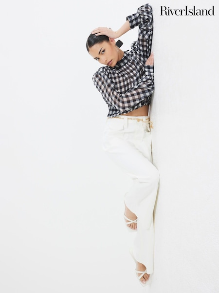 River Island White Petite High Rise Relaxed Flare Jeans (W32377) | €78