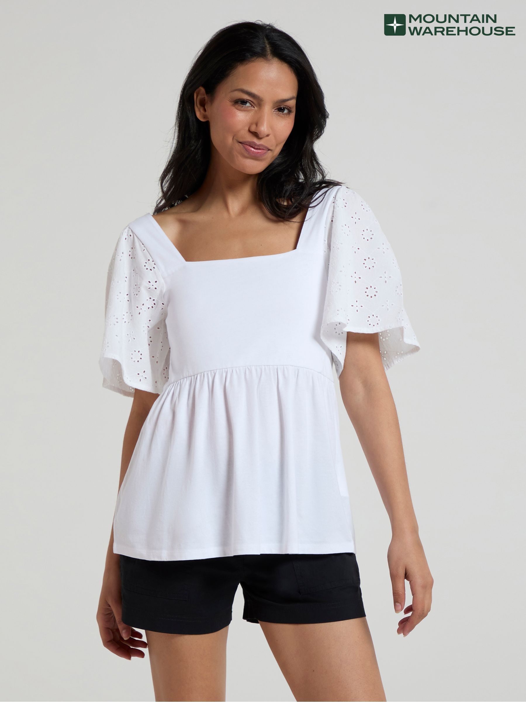 white broderie peplum top