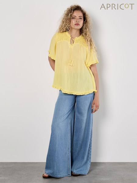 Apricot Yellow Smocking Tassel Tie Ruffle Top (W83664) | €44
