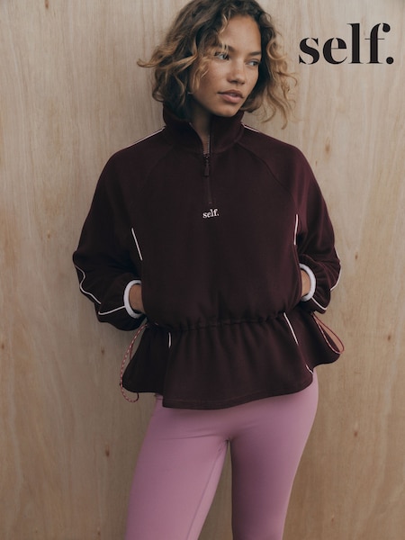 Burgundijos raudona - Self. Microfleece Half Zip Peplum Sweatshirt