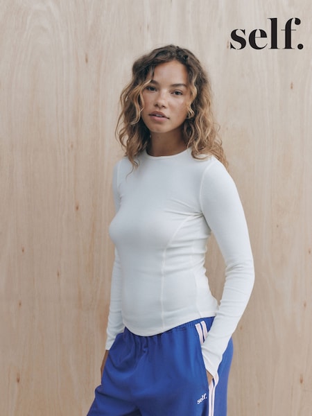 بيج فاتح - Self. Viscose Blend Long Sleeve Rib T-shirt