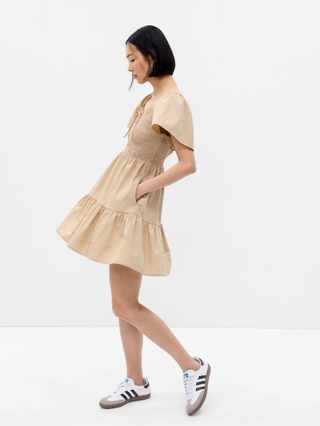 Neutral Flutter Sleeve Smocked Mini Dress (K64040) | £19