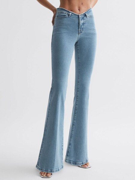 Good American Distressed Flared Jeans in Blue (N06798) | £90