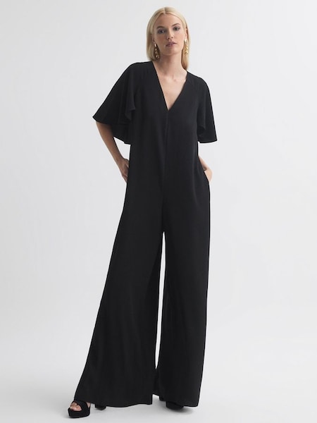 Florere Relaxed Fit Cape Sleeve Jumpsuit in Black (N33330) | £90