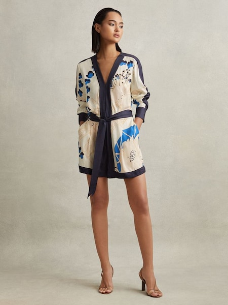 Blauwe playsuit met print en riem (215299) | € 325