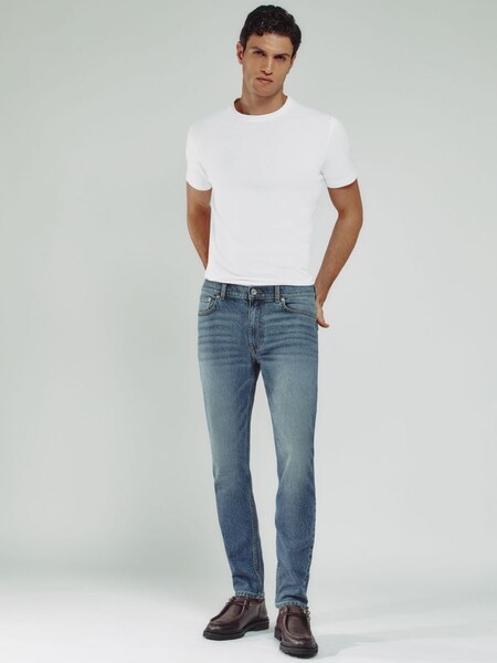 Cotton-Stretch Slim-Fit Jeans in Washed Indigo Green Cast (AG3771) | US$160