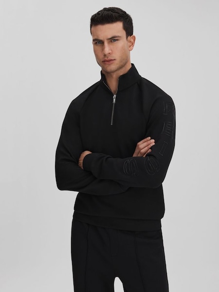 Interlock - Zwarte jersey trui met trechterkraag en korte rits (K74347) | € 170