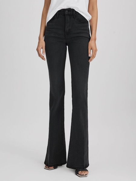 Good American Distressed Hem Bootcut Jeans in Black (Q91840) | $280