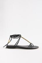 Black Signature Leather Flat Strappy Sandals with Metallic Wrap Detailing