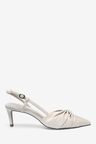 bone slingback pumps