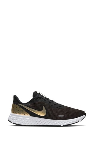 nike black shoes with gold logo