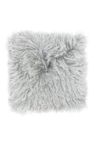 grey fluffy cushion