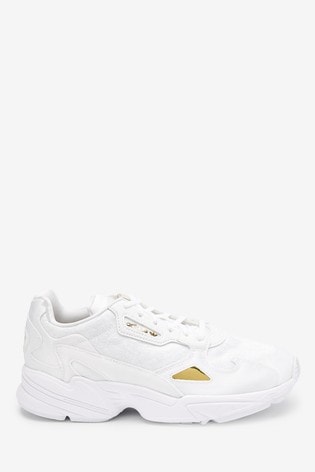 adidas originals falcon trainers in white and gold