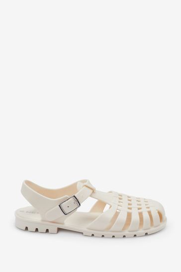 white jelly sandals